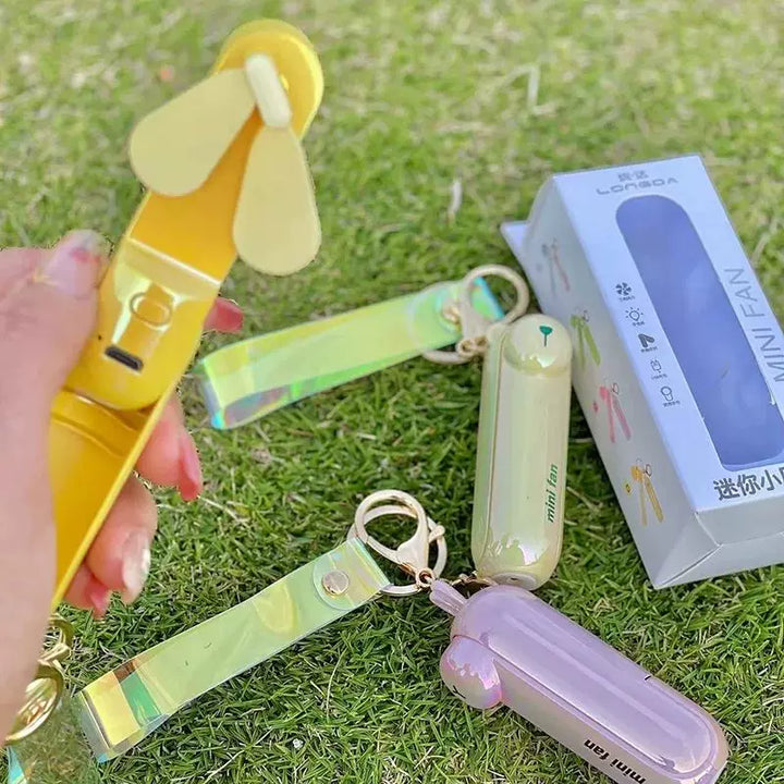 Unisex enhetsstørrelse oppladbar nøkkelring håndholdt mini-vifte med håndleddsstropp og ny art frosk charm Luvikno