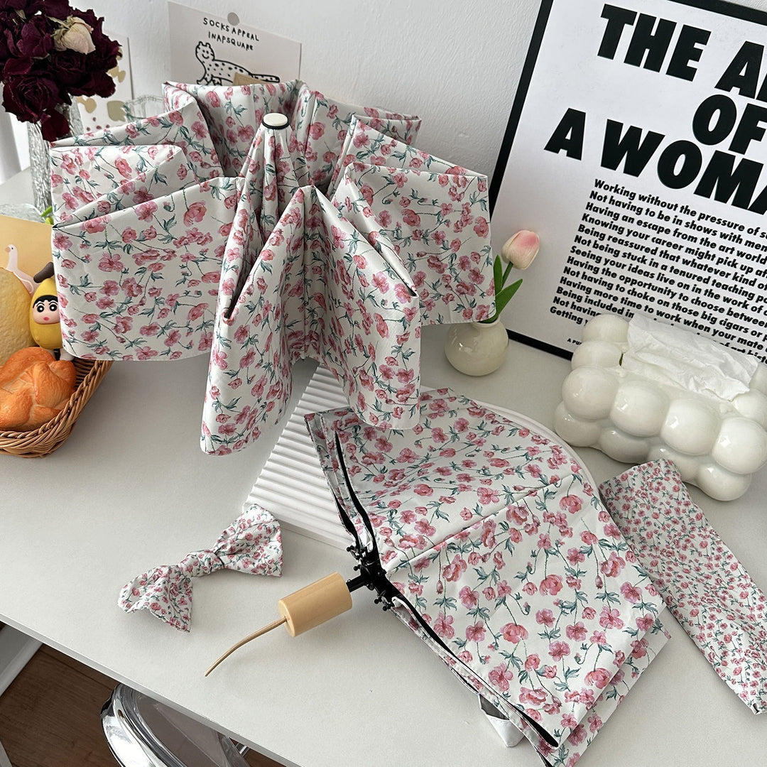 Dame sammenleggbare paraply med blomsterdesign og praktisk oppbevaringssystem Luvikno