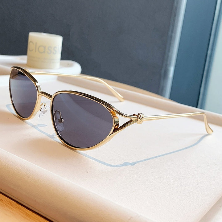 Dame Cat-Eye solbriller med elegant gullramme og polarisert glass Luvikno