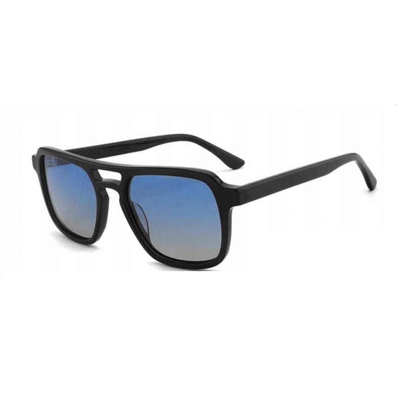 Dame solbrille med robust, stilisert plastramme og harmonisk avrundede glass Luvikno