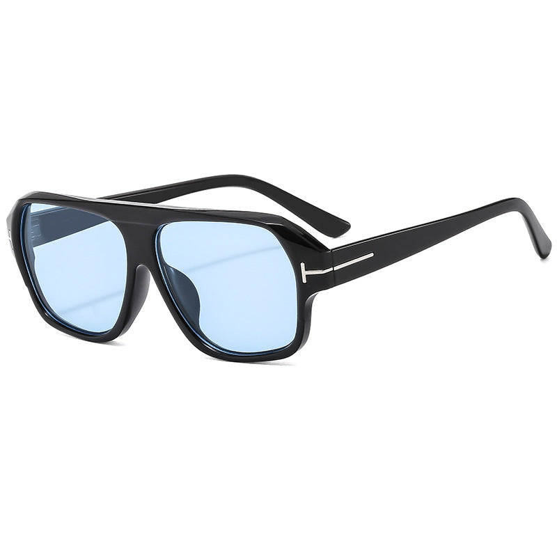 Dame modische solbrille med markant geometri og brune glass Luvikno