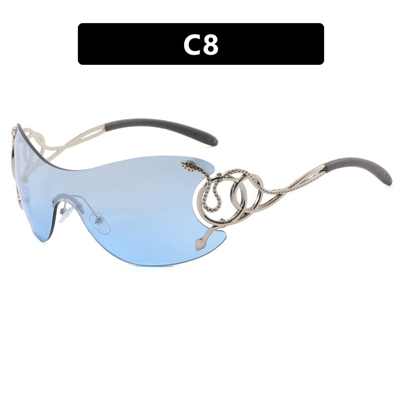 Dame futuristisk solbrille med lekent design Luvikno