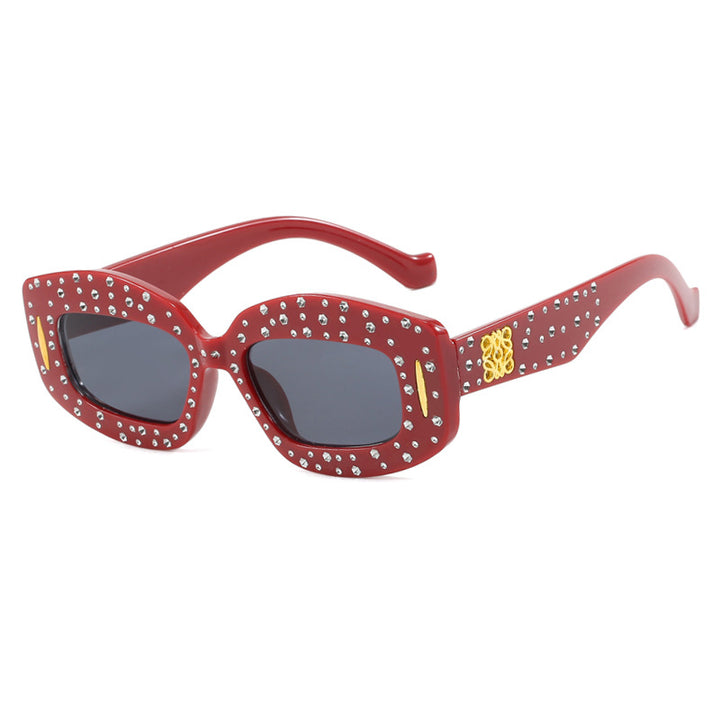 Dame moteriktig solbrille med glamorøs strass-dekor Luvikno