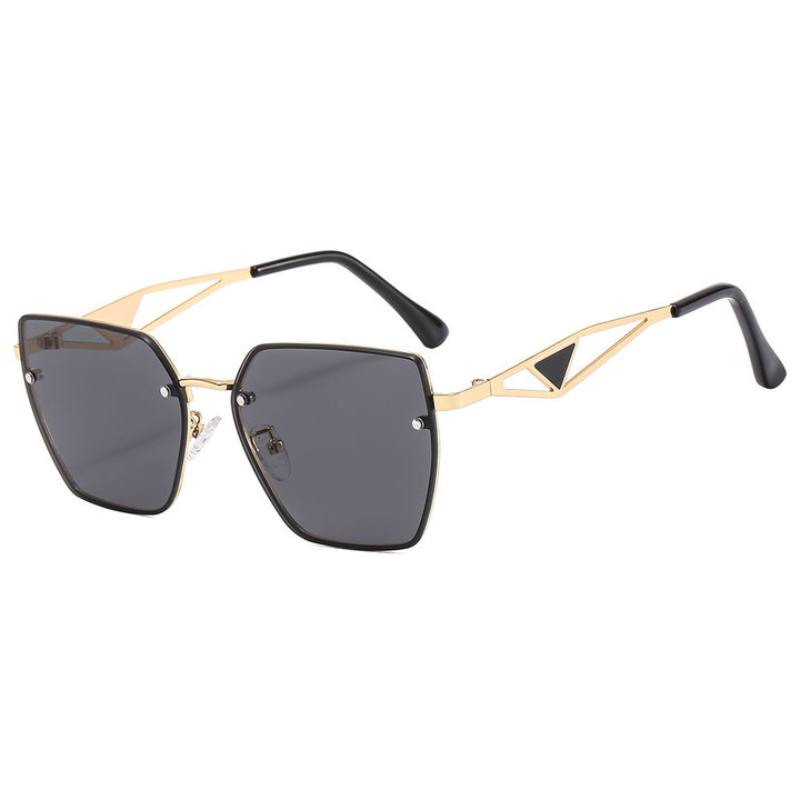 Dame geometrisk solbrille med filigran design Luvikno