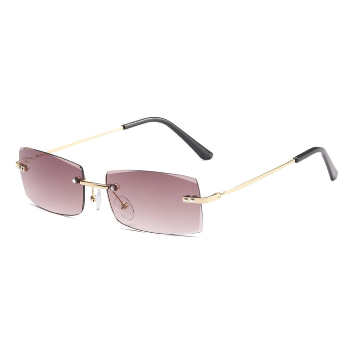 Dame moteriktig solbrille med elegant, filigranramme Luvikno