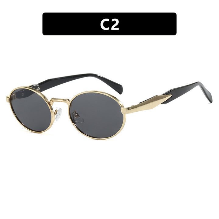 Dame moteriktig solbrille i elegant ovaldesign med trendy detaljer Luvikno