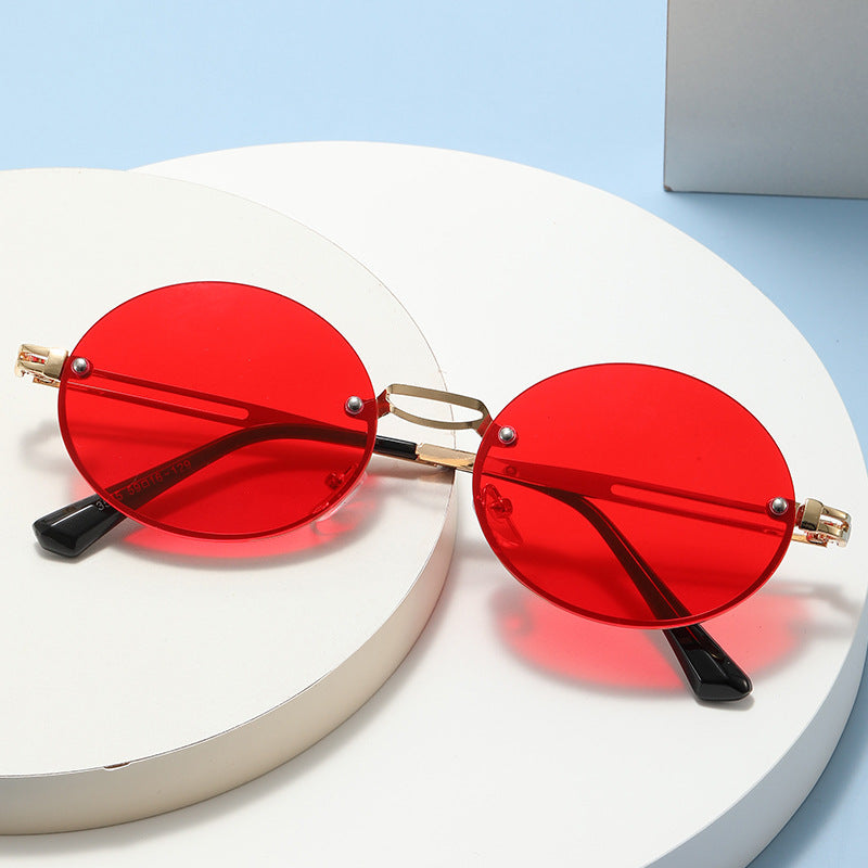 Dame rund solbrille med fin metallramme Luvikno