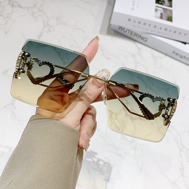 Dame moteriktig solbrille med trendy hjerte-design Luvikno