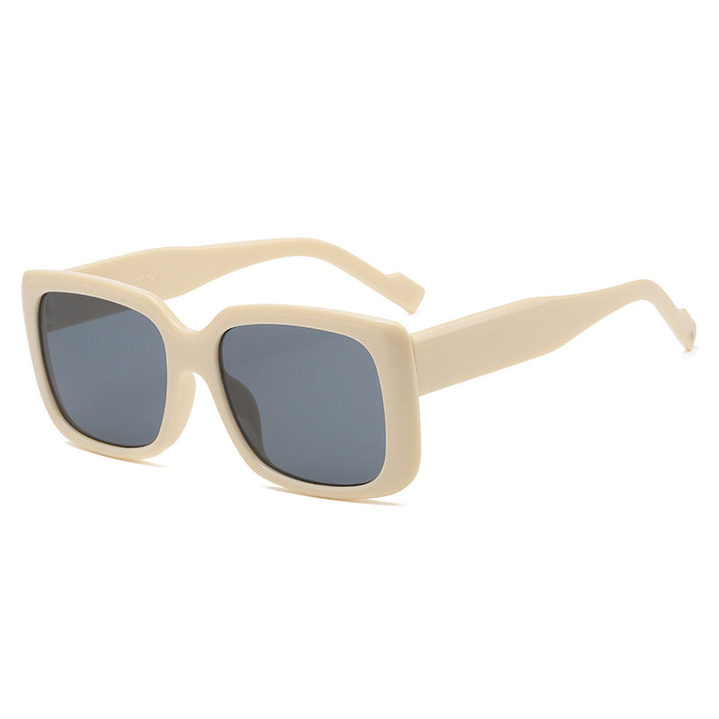 Dame moteriktig kvadratisk solbrille med gjennomsiktig ramme og innovativt design Luvikno