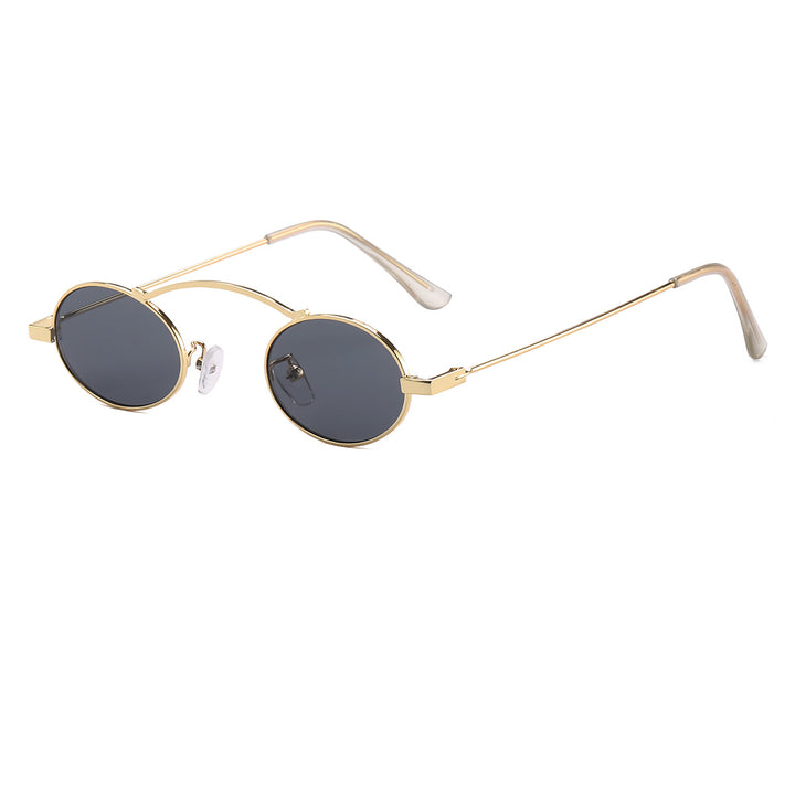 Dame moteriktig solbrille med unike sirkulære rammer og karakteristiske linser Luvikno