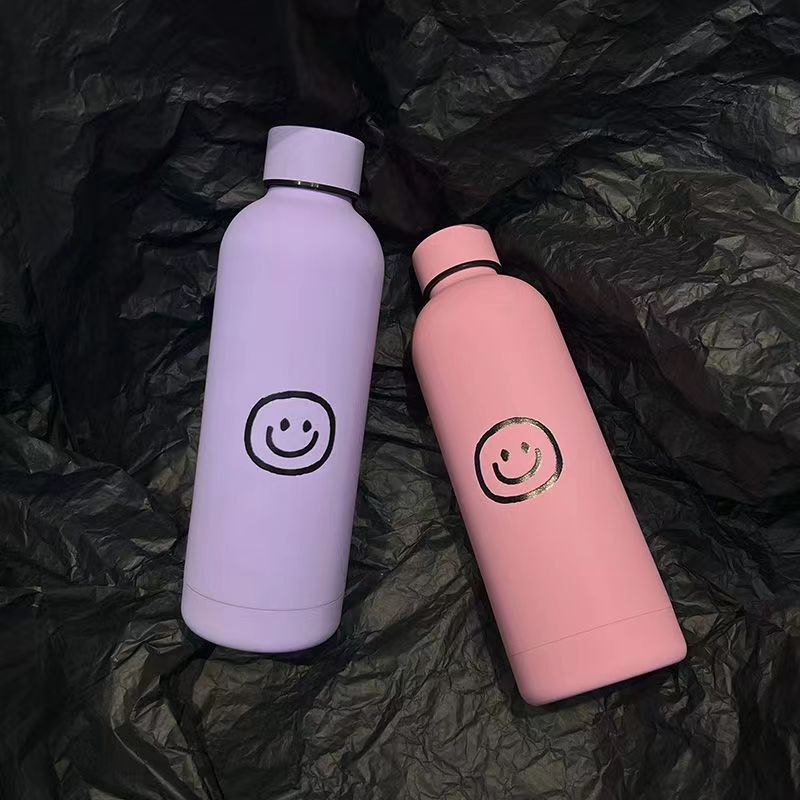 Damen Isoliertrinkflaske med lyst smilmotiv Luvikno