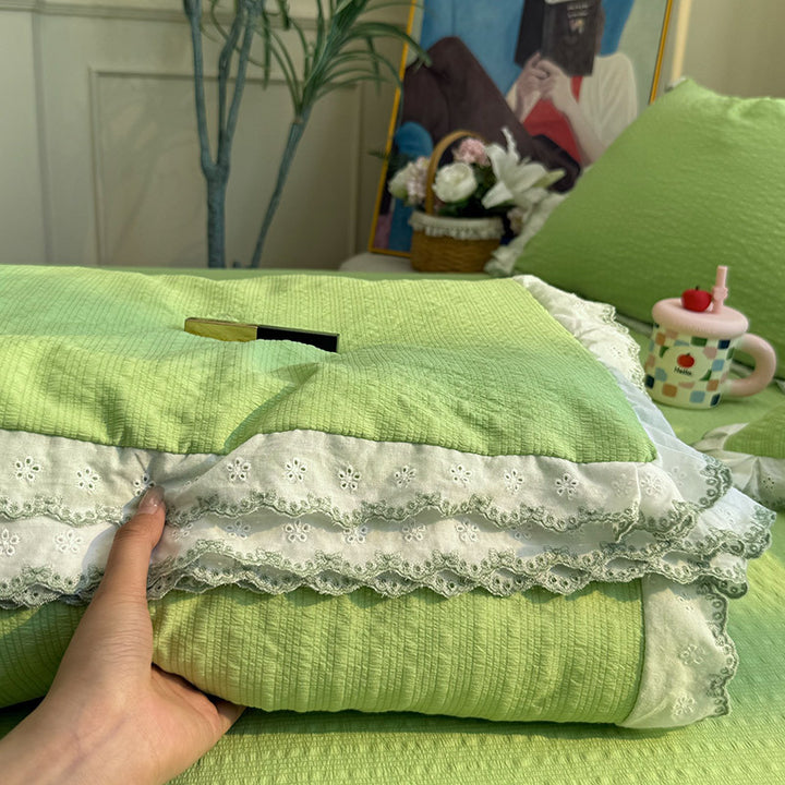 Dame sengeteppe med elegante spisseutsmykninger og fin bomullsoverflate Luvikno