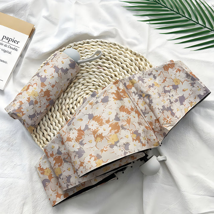 Damer Sammenleggbart paraply med elegant blomsterdesign Luvikno