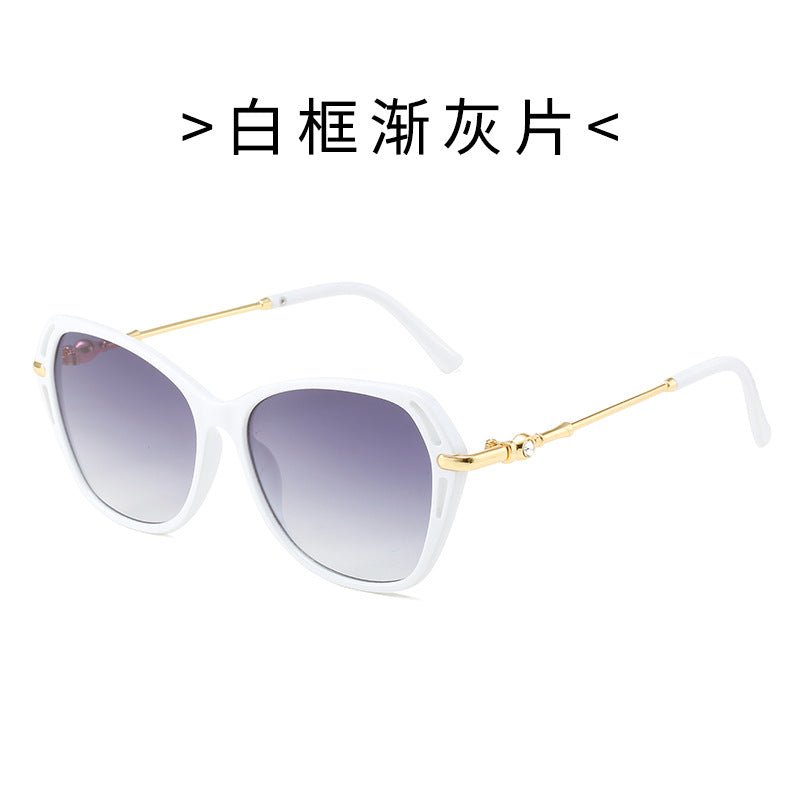 Dame moter Cat-Eye solbrille med elegant metallramme Luvikno