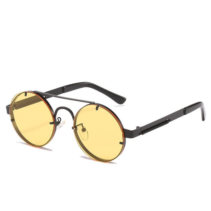 Dame rund designer solbrille med innovativ metallramme og beskyttende linser Luvikno