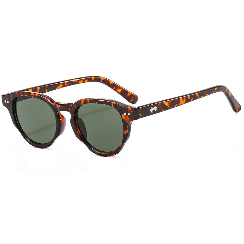 Dame modische solbrille med oval ramme og grønt glass Luvikno