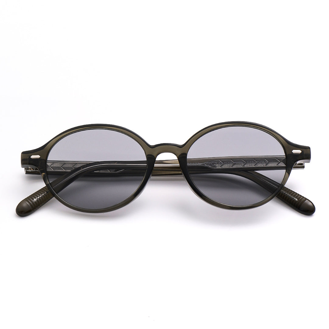Dame moteriktig solbrille i oval design med stilige detaljer Luvikno
