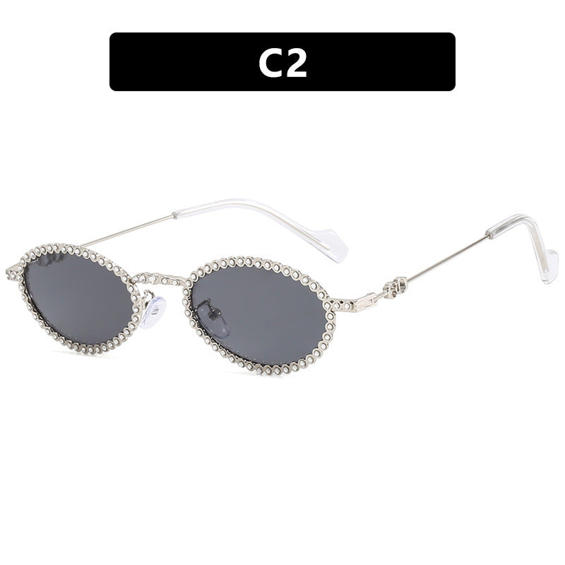 Dame moteriktig solbrille med unik, lekende kant Luvikno