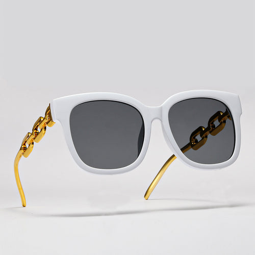 Dame moteriktig oversized solbrille med luksuriøs kjedeinnramming Luvikno