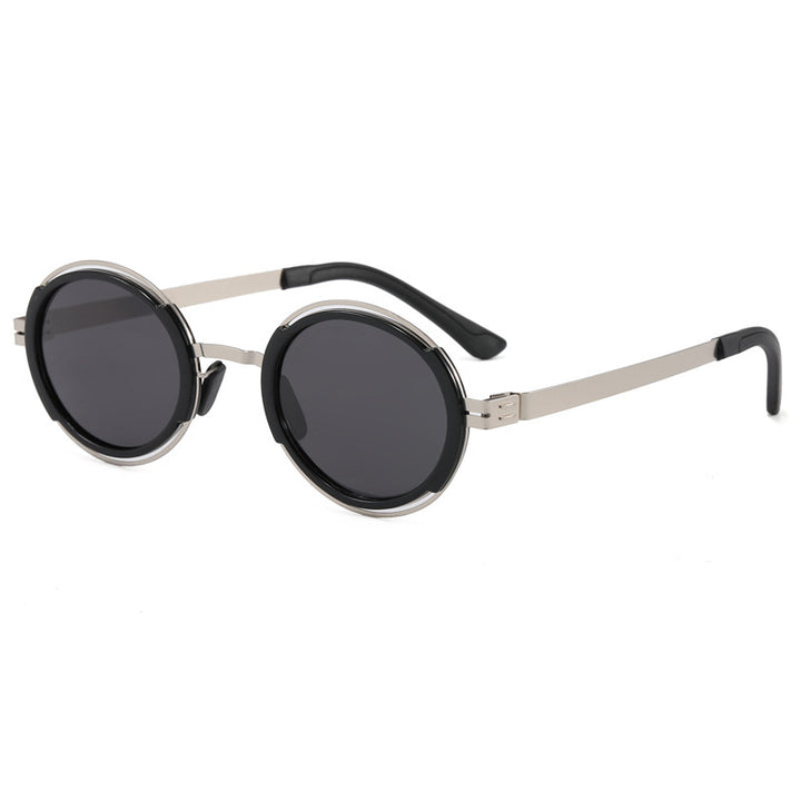 Damer moteriktig rund solbrille med elegant metallramme Luvikno