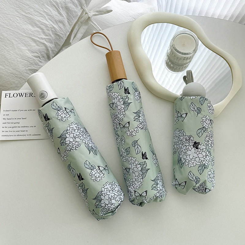 Dame Faltbar paraply med innovativt blomsterdesign Luvikno