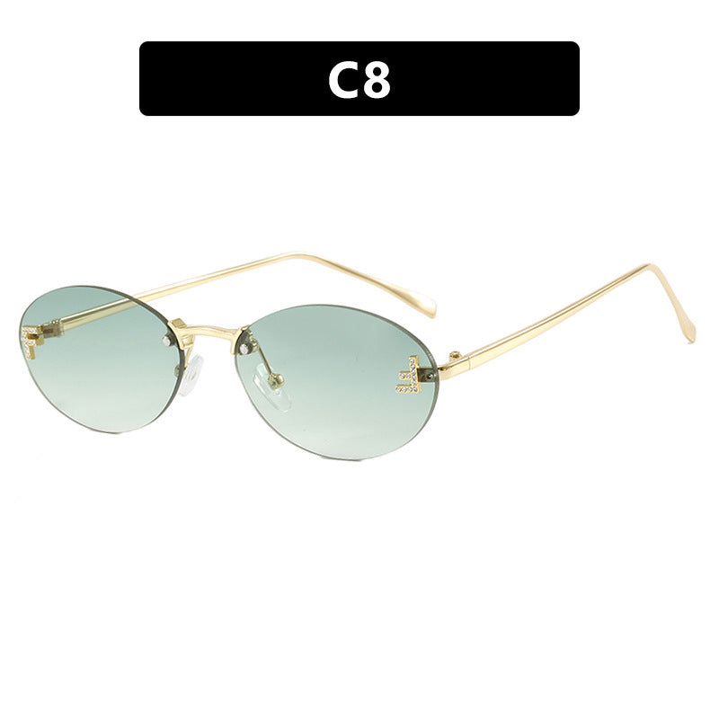 Dame mote trendy solbriller med elegante, runde glass og filigran metallramme Luvikno