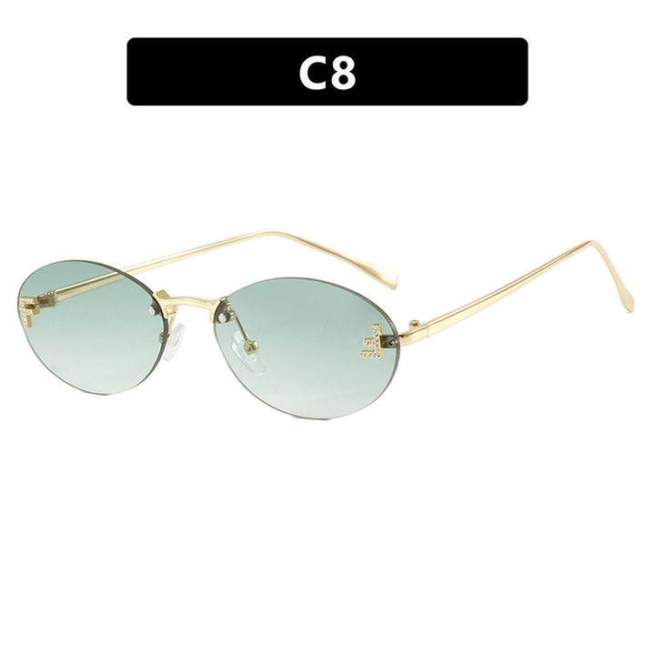 Dame mote trendy solbriller med elegante, runde glass og filigran metallramme Luvikno