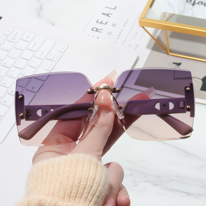 Damer Høyverdig rektangulær solbrille med stilfull metallramme Luvikno