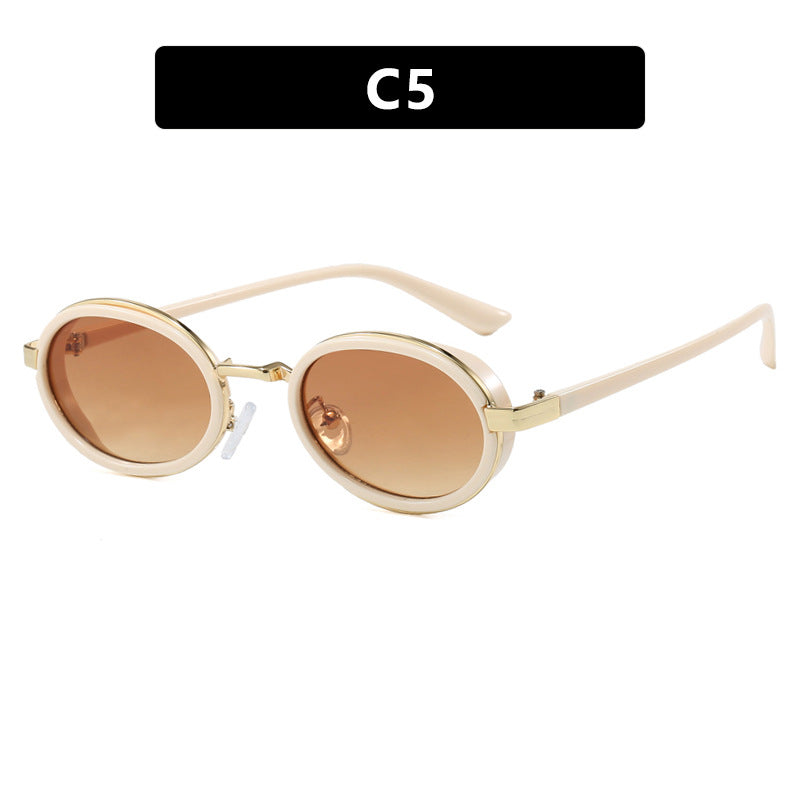 Dame rund solbrille med lette glass og gyldne detaljer Luvikno