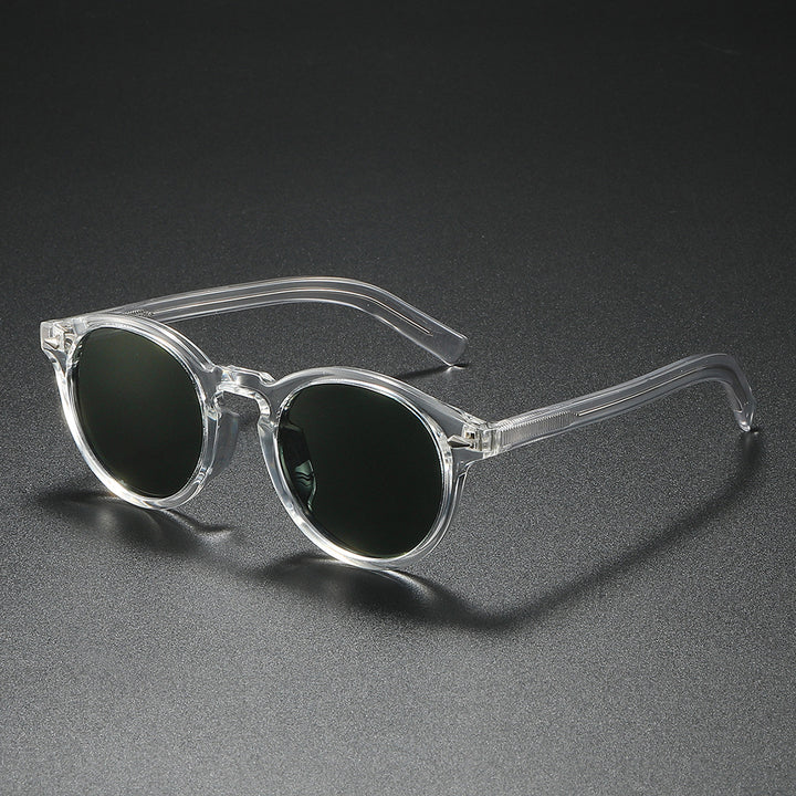 Dame Rund-solbrille med transparent ramme og reflekterende glass Luvikno