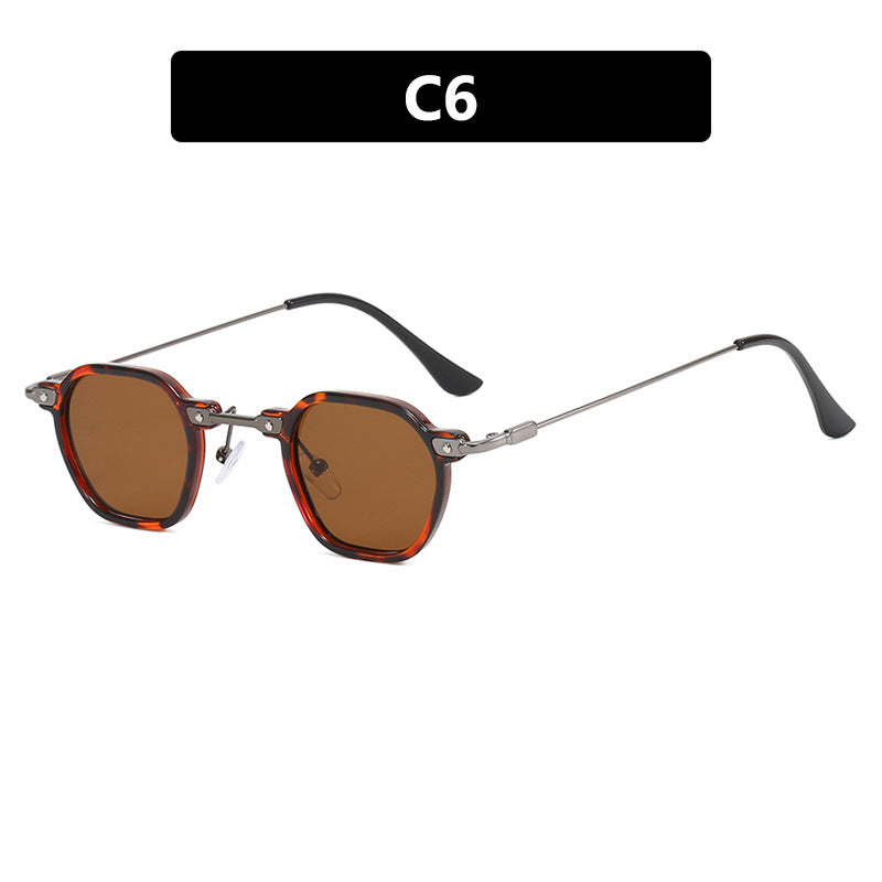 Dame moteriktig solbrille i elegant design med sekskantet ramme Luvikno