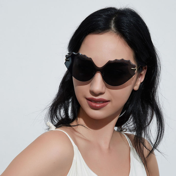 Dame solbrille med unik bølgedesign Luvikno