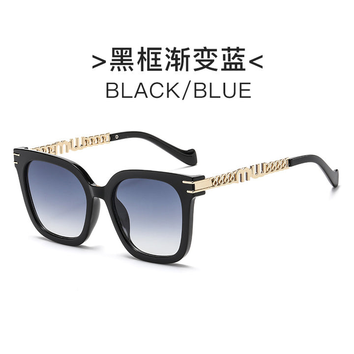 Dame designer solbrille med elegant metallramme og speilende linser Luvikno