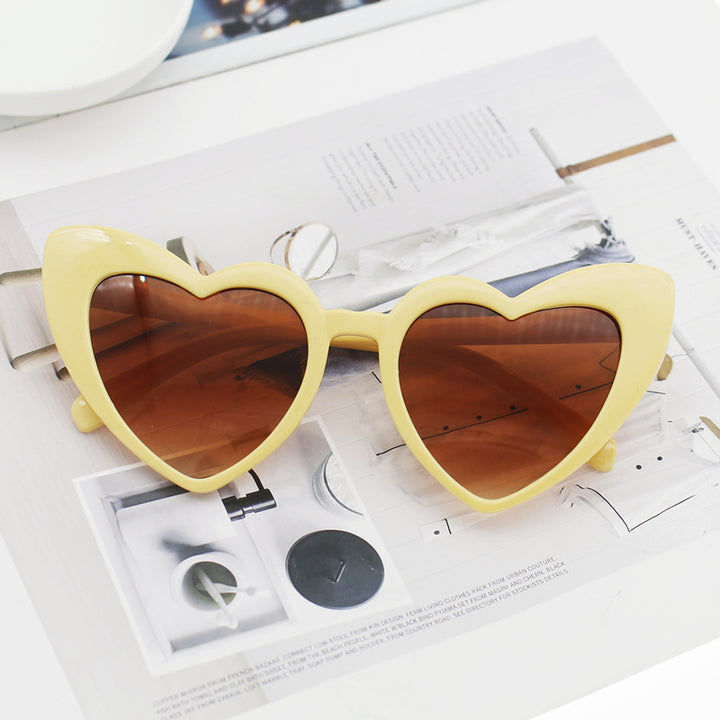 Dame hjerteformet solbrille med glitrende ramme Luvikno