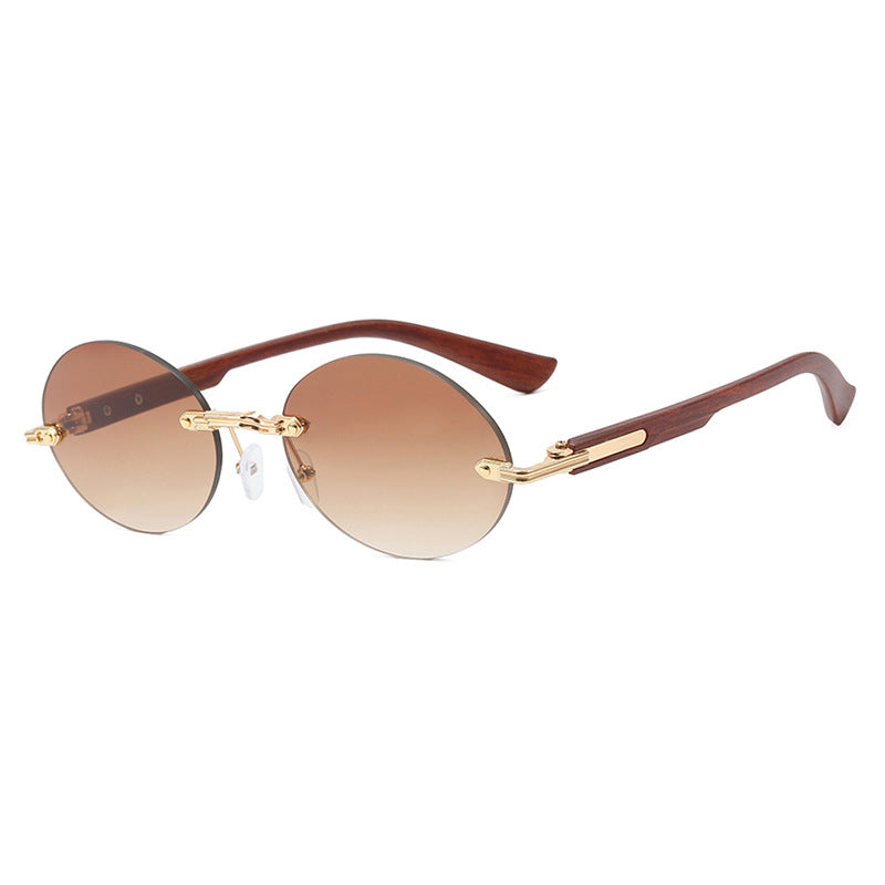 Dame rund solbrille med elegant treinnramme og UV-beskyttelse Luvikno