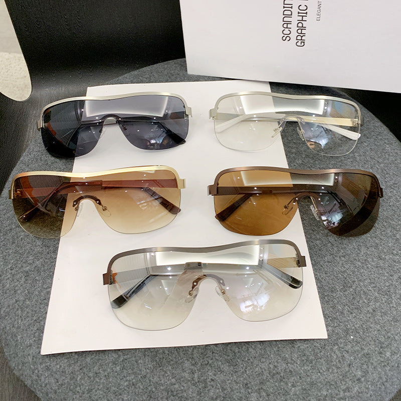 Dame futuristisk solbrille med elegant minimalistisk design Luvikno