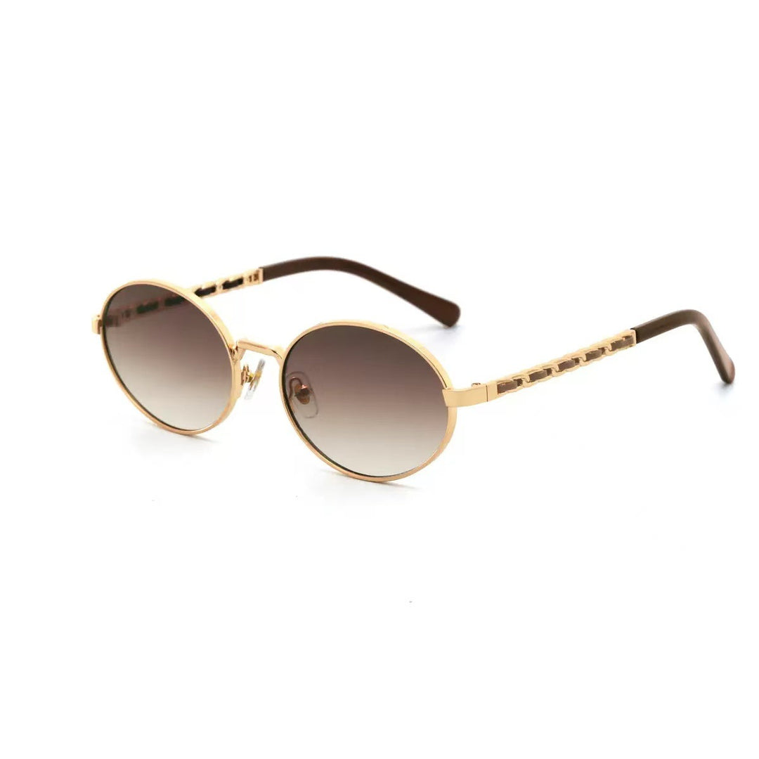 Dame elegant rund solbrille med luksuriøs ramme og komfortable stenger Luvikno