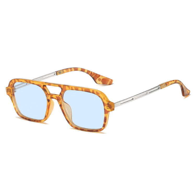 Dame designer solbrille med blå linser Luvikno