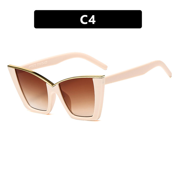 Dame ekstravagant solbrille med unik design og gullige aksenter Luvikno