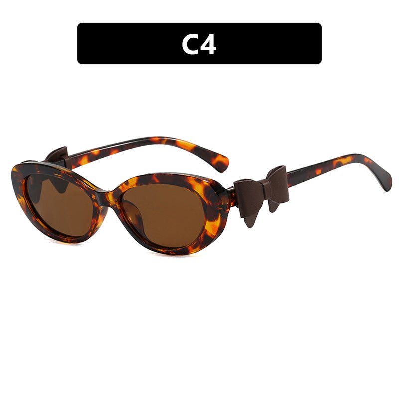 Dame moteriktig solbrille med lekent sløyfedesign Luvikno