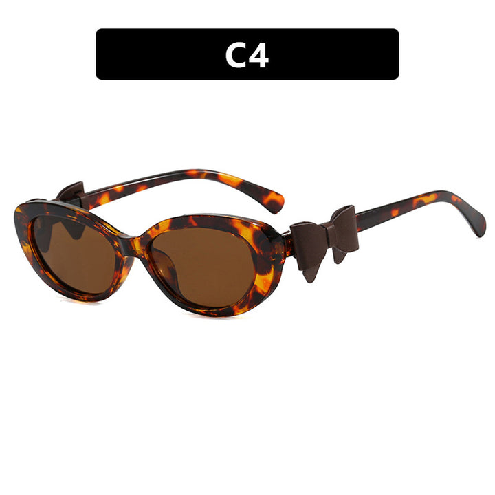 Dame moteriktig solbrille med lekent sløyfedesign Luvikno