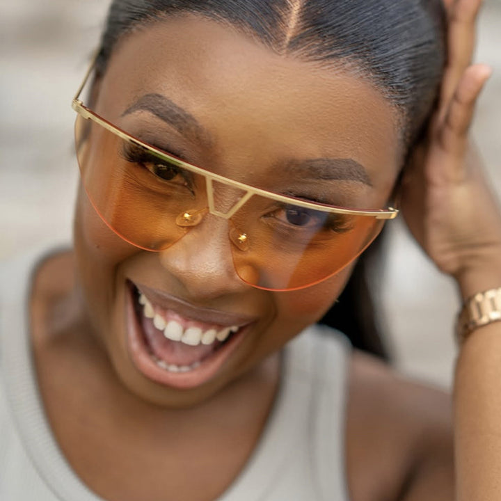 Dame futuristisk solbrille med beskyttende metallramme Luvikno