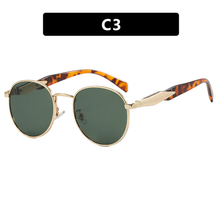 Dame rund solbrille med elegant, gyllen ramme og UV-beskyttelse Luvikno