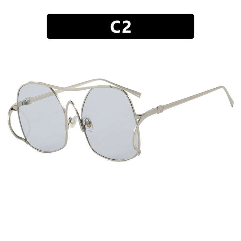 Dame geometrisk solbrille med smal metallramme og brune glass Luvikno