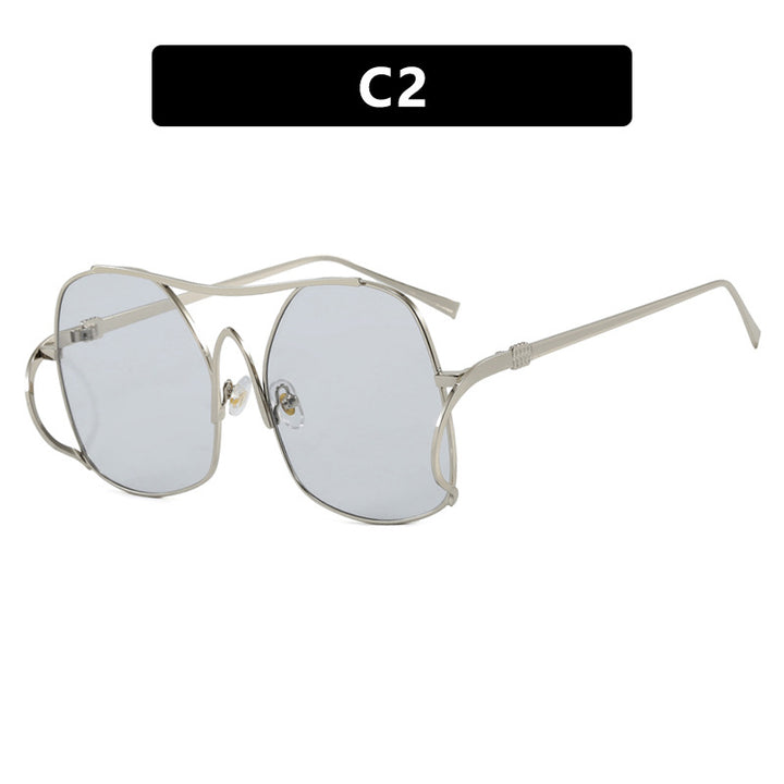Dame geometrisk solbrille med smal metallramme og brune glass Luvikno