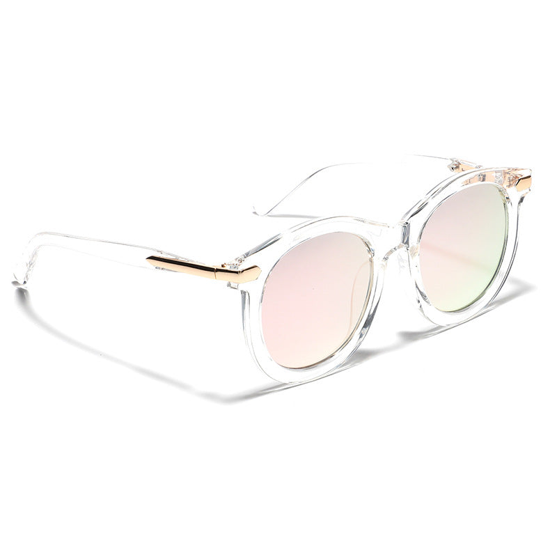 Dame moteriktig solbrille med gjennomsiktig ramme og gull accenter Luvikno