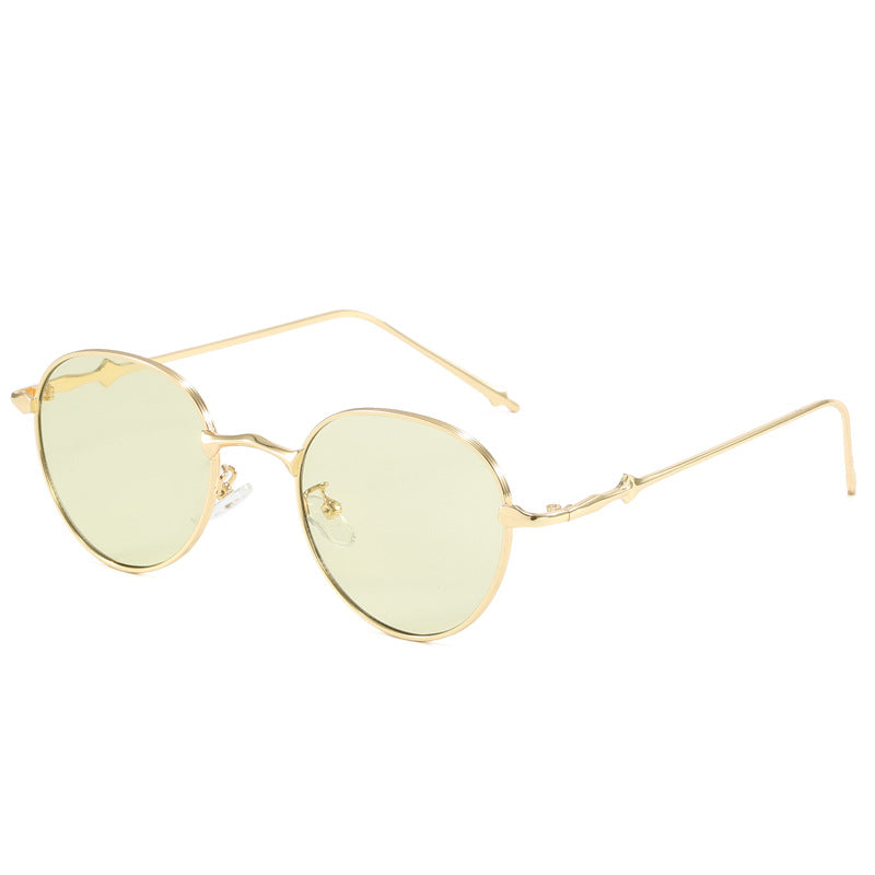 Dame elegante runde solbriller med moderne metallramme Luvikno