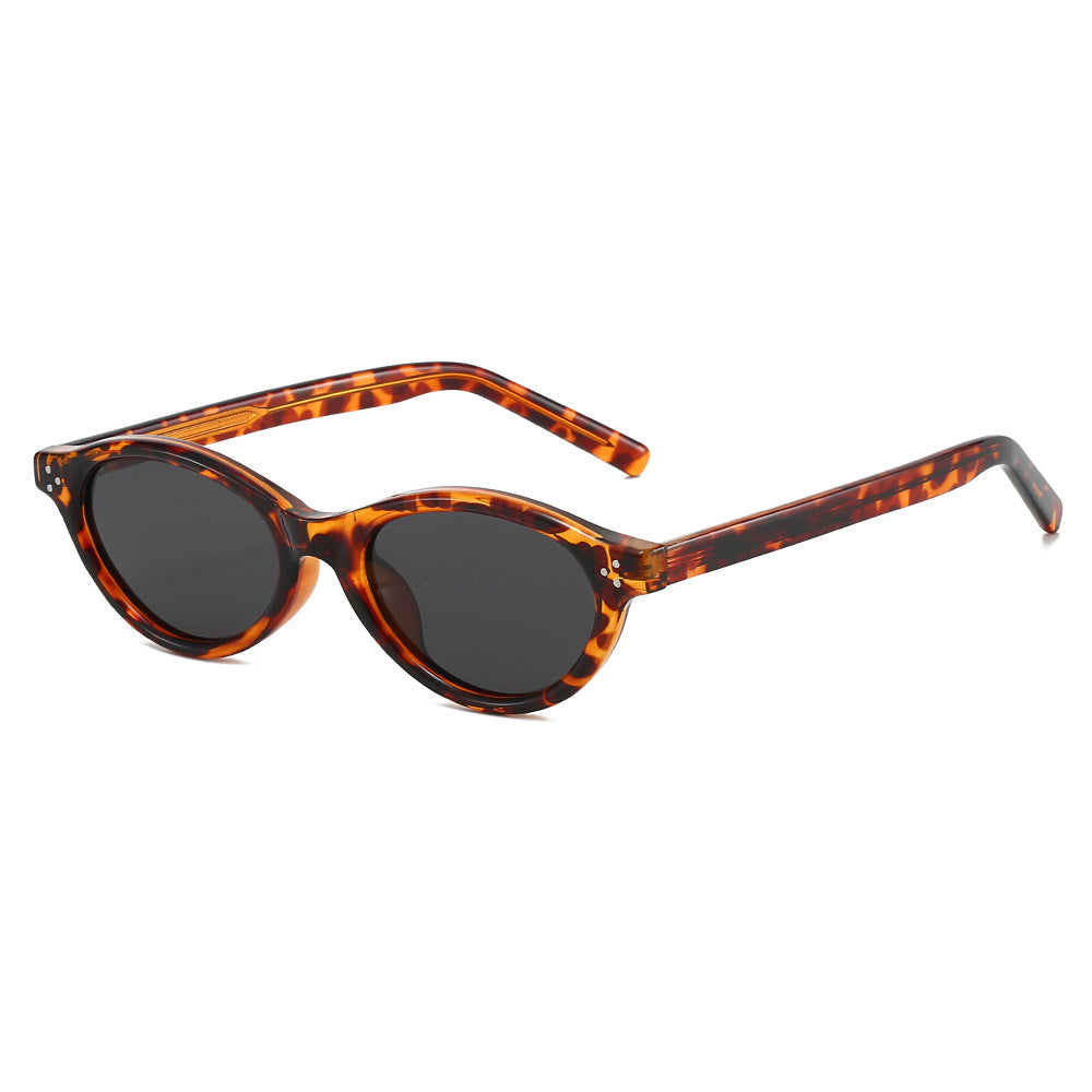 Dame Cat-Eye solbriller med elegant, transparent ramme og UV400-beskyttelse Luvikno