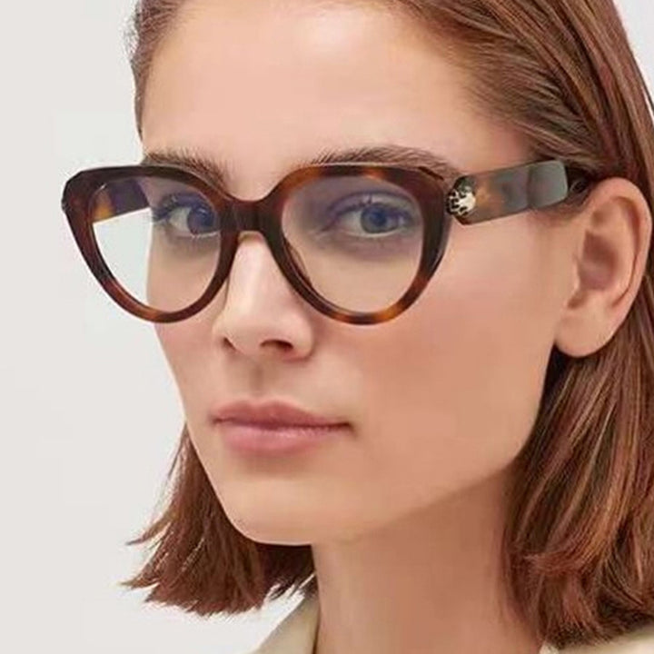 Dame Cat-Eye solbriller med gullige detaljer og beskyttende UV-filter Luvikno