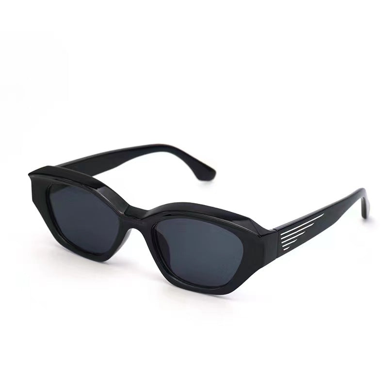 Dame Designer-solbrille med markant polygonal ramme og UV-beskyttelse Luvikno